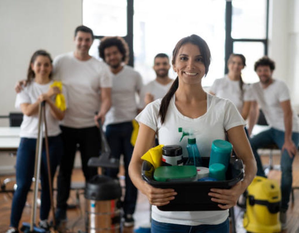 Professional cleaner vacuuming living room in Santaquin, UT home