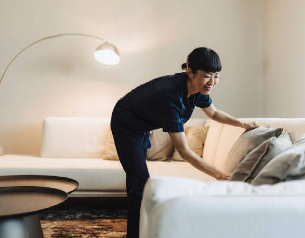 Beehive House Cleaning team scrubbing spotless kitchen surfaces